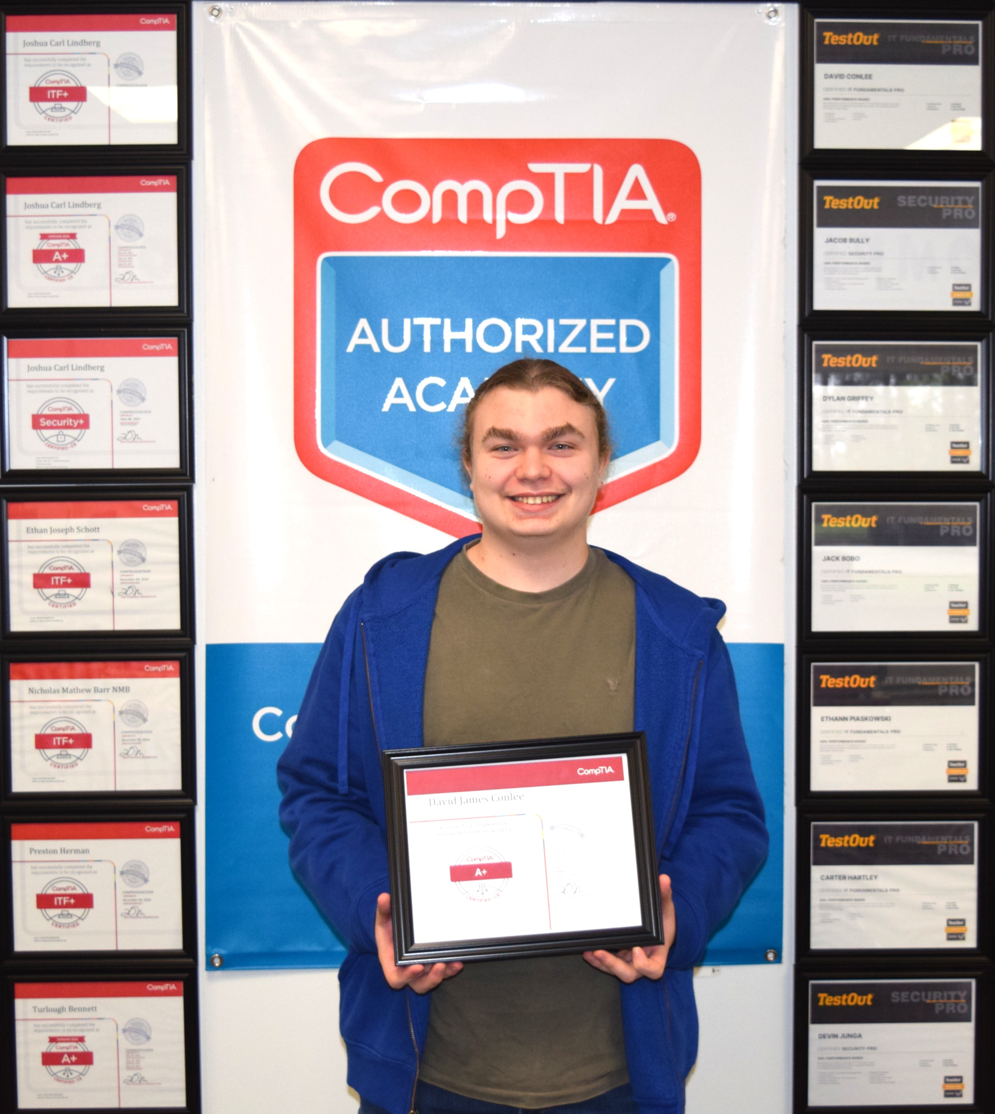 Cros-Lex student holding earned certifications